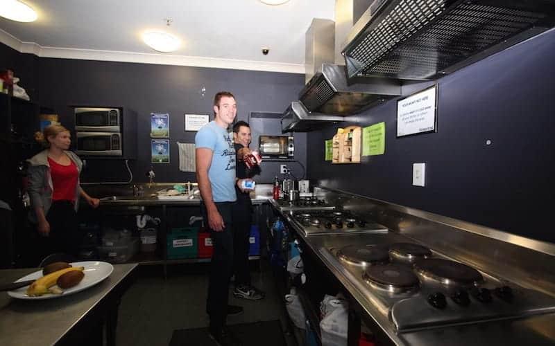 communal kitchen at nomads wellington backpackers